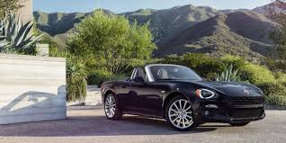 Unbiased car reviews and over a million opinions and photos from real people. Fiat 124 Spider Review Fiat Miata First Drive