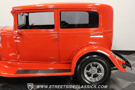 Image result for Garnet Maroon 1931 Oldsmobile