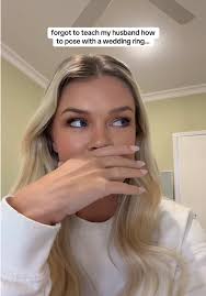 Bride Ans Groom Flipping Off at Camera