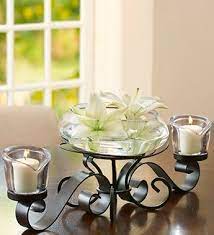 Grouping beautiful candles holders on your dining room table adds visual weight and presence to a table. Illuminate Your Dining Room Table And Home Decor With A Stunning Votive Candle Centerpie Lighted Centerpieces Candle Table Centerpieces Dining Room Centerpiece