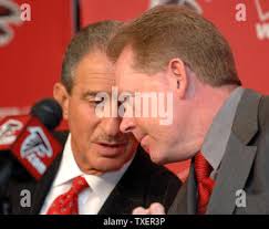 Atlanta Falcons head coach Arthur Smith speaks to side judge Don Willard  (58) during the second half of an NFL football game against the Green Bay  Packers, Sunday, Sept. 17, 2023, in
