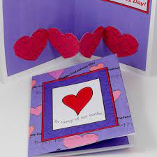 Touch device users, explore by touch or with swipe gestures. Make A Valentine Heart Chain Pop Up Card Valentine S Day Crafts Aunt Annie S Crafts