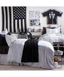 9 Dorm Room Decoration Ideas Dujour Dorm Room Decor Guy Dorm Rooms Dorm Room Inspiration