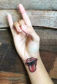 Wrist Tattoo Cover Up Of The Rolling Stones Logo Made By Rian Pranata In Bali Adweek Com Explains The Story Red Tattoos Stone Tattoo Wrist Tattoo Cover Up