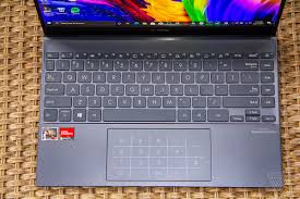 If you would like to revert back to the original keyboard light setting then all you need to do is to click on the reset to default button which can be found at the upper right side of the system. Asus Zenbook 13 Oled Review Dazzling To A Point The Verge