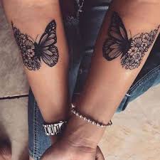 Butterflies, a cool background and a few flowers are a nice idea for a sleeve! Beautiful Butterfly Tattoo Ideas For Women Dope Tattoos