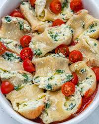 Stuff rolled lasagne sheets with creamy spinach and ricotta and bake with tomato and mascarpone sauces for a filling vegetarian meal. Spinach And Ricotta Stuffed Pasta Recipe Healthy Fitness Meals