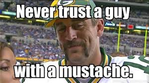 We completely forgot about his long locks, which looked absolutely amazing. Aaron Rodgers Mustache Memes
