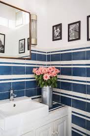 Fifty genius small bathroom decorating and layout ideas, design tricks, and more to make the most of even the tiniest spaces. Search Results For Back To Basics Image 523a0d089ac35f467e2e5e7c Source Type Share Source Id 974995 Domino Home Striped Tile Bathroom Design Small