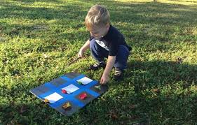 A Backyard Toddler Color Chart With Colorful Fall Leaves