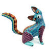 Alebrijes are brightly colored mexican folk art sculptures depicting fantastical creatures or familiar animals. 1