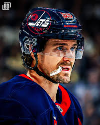 Thomas Chabot gave Josh Norris a French lesson