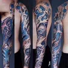 Tattoos Oberarm Grosse Farbige Dreidimensionale Biomechanische Tatowierung Tattoos Oberarm Biomech Tattoo Grosse Tattoos