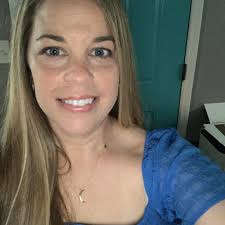 Where should a family of four stay in New York to see Hamilton?