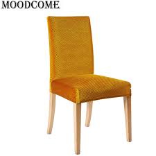 These travers velvet upholstered side chair are crafted using a durable steel frame with sturdy slim pleated golden legs which exude luxury within the dining area or open kitchen in the home. Dining Chairs Cheap Gold Velvet Chair Cover Elastic New Arrival Stoelhoezen Eetkamer Kitchen Hotel Dining Chair Cover Office