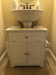 The Pedestal Sink Storage Cabinet Hammacher Schlemmer In 2020 Pedestal Sink Storage Pedestal Sink Sink Storage