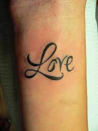 Love Writing Tattoo On Wrist Love Wrist Tattoo Trendy Tattoos Tattoo On Wrist