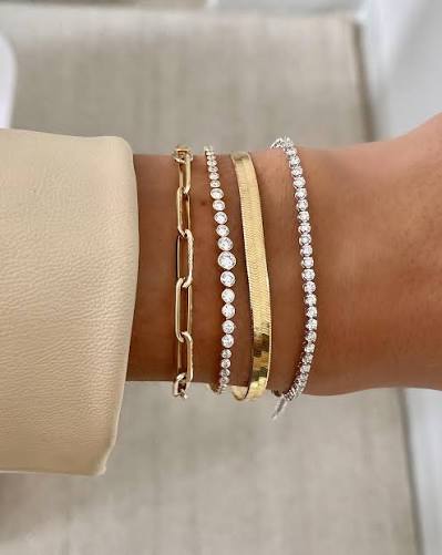 Clean girl aesthetic meets jewelry. Simple yet stacked.