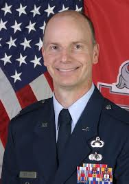 Col. Ash Worboys (left), Director of the Department of Distance Education,  presents the John J. Pershing Award for AOC Cohort 16-02 to Maj. Amanda  Basic, United States Army Reserve. The Pershing Award