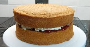 Fold in the sifted flour and carefully pour the mixture into the prepared tins. All In One Victoria Sandwich Sponge Cake