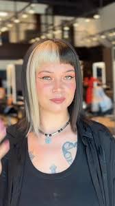 ⚡️🕷️ Spooky season calls for bold moves. Our super talented artist Pachia  at our Southcenter salon just took Bella Mae’s black + white micro bangs  and razor bob to the next level—serving goth goddess, ...