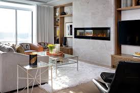 When it comes to the condo living room designs, keep the furniture limited to a large seating area or a comfortable couch. New Build Luxury Condo Jane Lockhart Design