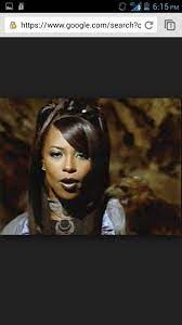 Sebatian laminates drops to keep her hair smooth. Aaliyah Hairstyle From Are You Somebody Aaliyah Hairstyles Aaliyah Hairstyle