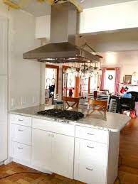 This island range hood has an led lamp that illuminates the area below the appliance to make cooking easier. The Life Of Ck And Nate Installing The Hood Kitchen Island Vent Kitchen Remodel Small Kitchen Island With Cooktop