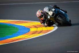 The Idea Is To Get Your Body Out And Beside The Bike As Low As You Can To Counter The Centrifugal Force And Keep The Bike Racing Bikes Racing Motorcycles Bike