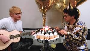 Bruno Mars Looks Low Key As He Shops For A Vespa Scooter With Girlfriend Jessica Caban Daily Mail Online