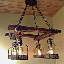 Any of our unique light fixtures can be customized with the type of bottle, wood stain, metal finish, canopy finish or cord type that you want. Handmade Rustic Light Wood Fixture Farmhouse Light Fixtures Rustic Light Fixtures Wood Chandelier Rustic