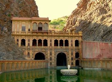 Ancient kunds and sandstone pavilions of Galtaji, AI generated
