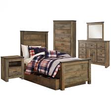 You've earned the right to shop tax free and enjoy free shipping! Ashley Trinell Panel Bedroom Set With Under Bed Storage In Brown Best Priced Quality Furniture In Orlando Florida