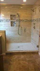 To avoid making the room too gloomy, choose tiles and floor in light shades of wood. Fabulous Bath And Shower Tile Designs To Your Home Budget Bathroom Remodel Large Tile Bathroom Shower Remodel