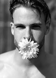 Man with bouquet flowers naked male gift mothersday or valentine gift  romantic handsome guy