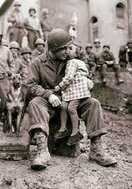 The Soldier Who Took a Bullet for a Child – Germany, 1945 During the final  push into Germany, an American GI saw a little girl standing in the  open—lost, crying. A sniper