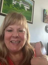 What is the expected pain level during a biopsy procedure?