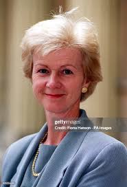 Kay Brock, a management consultant, at Buckingham Palace in London.... News  Photo