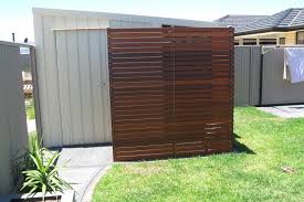 This wooden wall sculpture is not only visually pleasing but also efficient, serving as the conduit for an irrigation system. Showcase Outdoor Entertaining Area And Backyard Mansfield Park Adelaide Australia