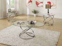 This round coffee table is ideal for setting the stage at home. 3 Pcs Occasional Table Set With Spinning Circles Base Design