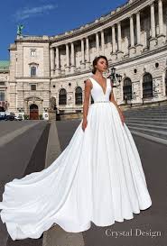 Crystal Design 2018 Sleeveless Deep V Neck Simple Princess Elegant Ball Gown A Line Wedding Dress Open Scoop Wedding Dresses Satin Wedding Dresses Bridal Gowns