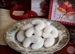 Austrian husarenkrapferl cookies, an almond shortbread dusted with icing sugar & finished off with a dollop of jam, will be the talk of the dessert table! Vanillekipferl Pronounced Va Nil Le Kip Ferl For Audio Click Here Are Traditional German And Austrian C Almond Flavor Christmas Baking Chocolate Chip Cookies