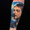 Remove plastic film from tattoo. 3