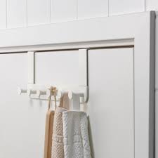 If a door rack fits over your door, and if you want your door to close, then the best option would probably be to modify the door itself rather than modify the door frame. Enudden White Hanger For Door Ikea