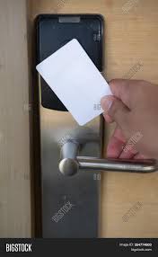 A door access card reader system provides peace of mind using a card reader for door access or key card gate access control helps keep unwanted. Man Hand Use Key Card Image Photo Free Trial Bigstock