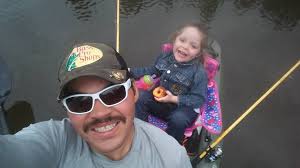Golf cart with kayak strapped to the roof