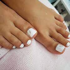 Whatever styling you choose to go with, you can be sure that your new fun white nail design will be awesome. 10 Elegant Toe Nail Designs For Spring And Summer Nicestyles Nails Design With Rhinestones Summer Toe Nails Toe Nail Color