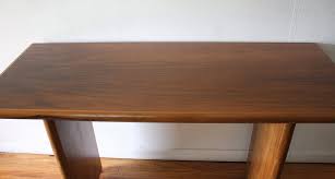 A lower shelf rounds out this piece's organization options with the perfect spot for larger clutter or spacious decorative objects. Mid Century Modern Console Table Picked Vintage