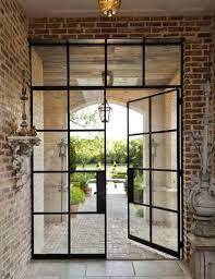Crittall, the largest and oldest steel window manufacturer in the world; What I M Pinning Steel Frame Industrial Doors Home Decor Lifestyle Steel Doors And Windows Iron Doors Double French Doors