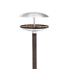 The metal post stakes securely into the ground. Modern Bird Houses Feeders For Birdwatching At Home Ylighting Ideas
